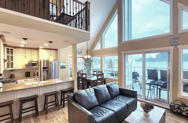 Exclusive lakefront 2-bedroom + loft cottage with high-end finishes, 3 queen beds, and a sofa bed. Dog-friendly