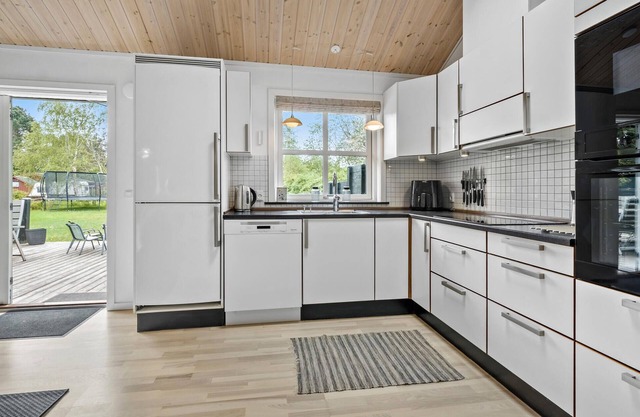 Experience a relaxing vacation in this classic Danish vacation home.