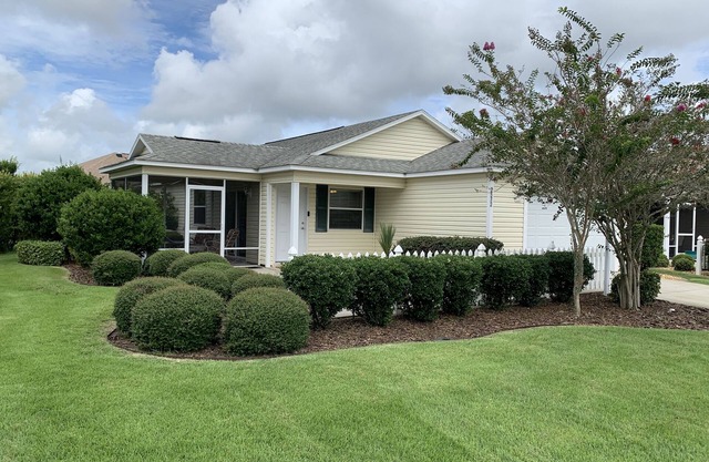 Experience the fun and excitement of The Villages in this beautiful Patio Villa.