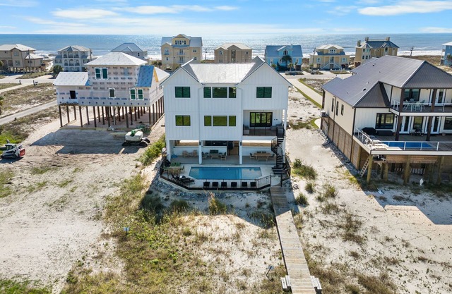 Exquisite lagoon front home with private pool, pier and boat lift