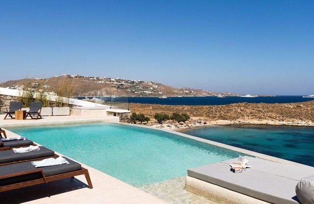 Villa exquise à Mykonos | Villa sur les rochers | 6 chambres | Piscine a debordement | Jacuzzi exter