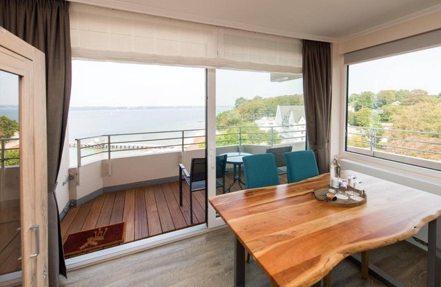 App. directement sur la plage avec vue sur l'eau, 2 balcons, cuisine entièrement équipée