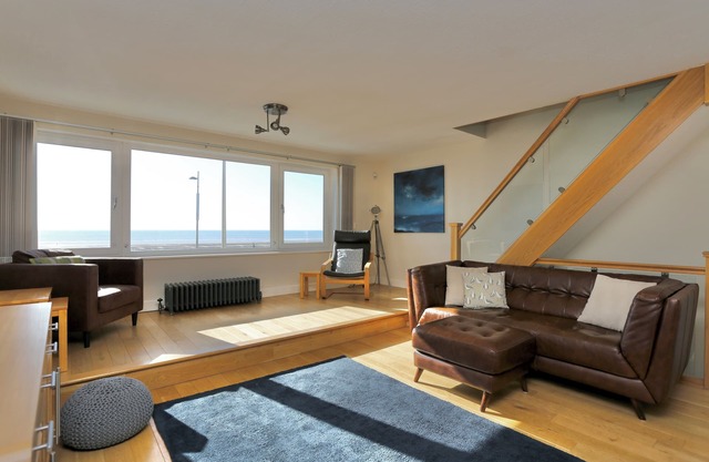 Fabulous beachfront 3 bed house with parking