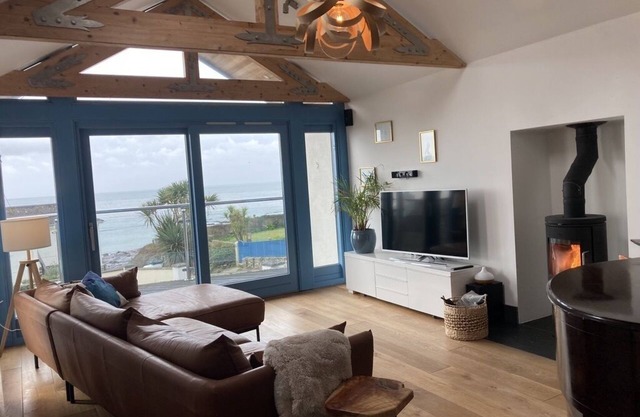 Family beach house w/hot tub, easy beachfront access, and sea views!