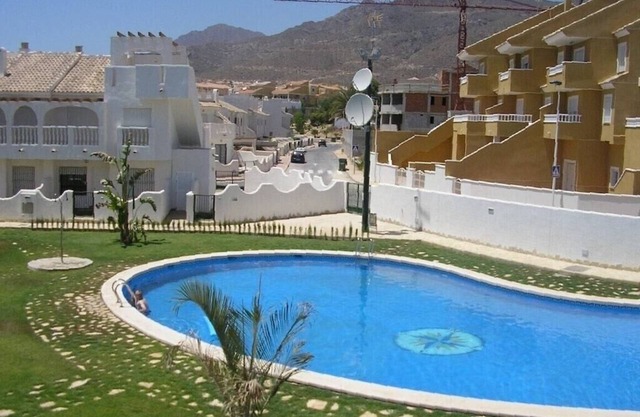 Family friendly apartment complex close to amenities and sea.