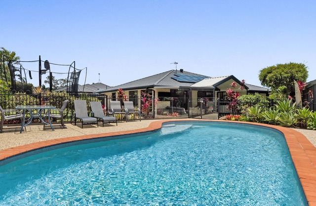 5 min to Beach, 4 Bed Home, in ground Pool, Outside Entertaining Areas.