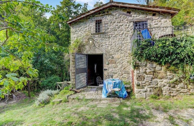 Petite maison avec un moulin du 17ème siècle