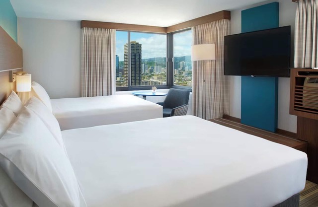 Family Retreat Steps Away from Waikiki Beach | 2 Rooms w/ Free Breakfast