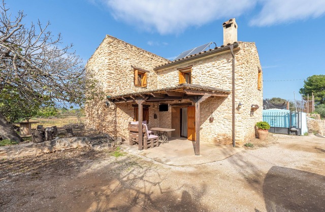 Maison de campagne 'Caseta Dels Cirerers' avec vue sur la montagne, Wi-Fi et climatisation