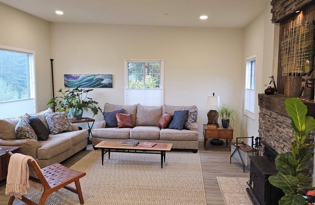 Farmhouse with 280 degree meadow views and amazing back patio.