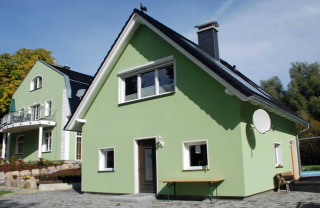 Maison de vacances arc en ciel avec cheminée et terrasse - appartements de manoir avec cheminée, sauna et piscine extérieure