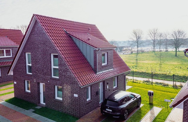 Ferienhaushälfte Wasserseite - Küsten Apartments Tannenhausen