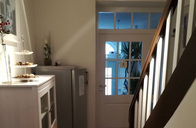 Appartement avec grand balcon donnant sur l'église paroissiale