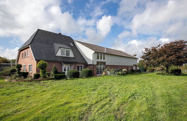 Appartement 'Ferienwohnung Schmidt Bergewöhrden' avec jardin partagé et Wi-Fi