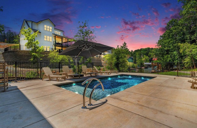 Firefly Estate, Lakefront Luxury w/ Covered Verandas + Heated Salt Pool, Hot Tub, Dock!