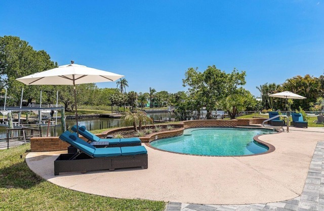 Flagstone · Waterfront ~ Pool ~ Game Room