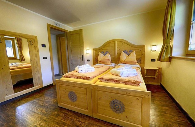 Appartement Blesecia - Baita Cusini avec vue sur les montagnes, espace bien-être et Wi-Fi.