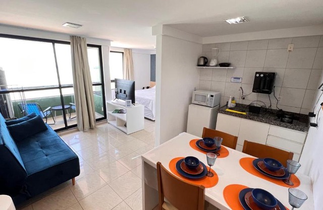 FLAT DE FRENTE PARA O MAR