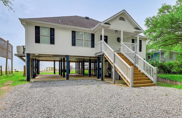 Foley Beach Cottage w/ Waterfront Backyard!