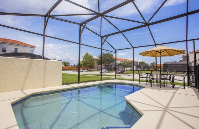 Four Bedroom w/ Screened Pool Close to Disney 4563