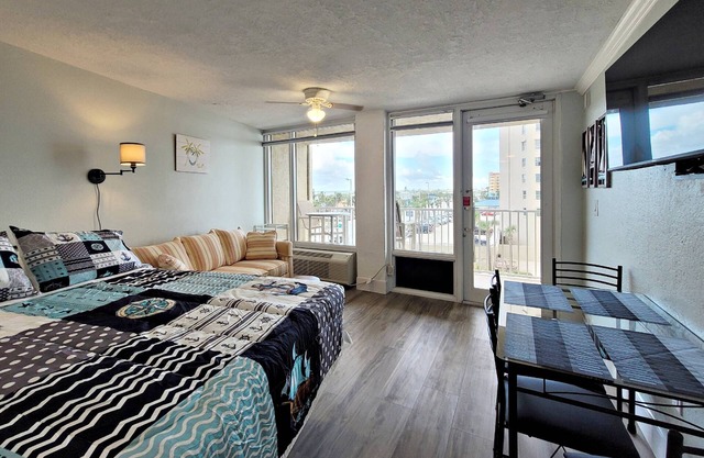 FREE DAILY ACTIVITIES! Corner Unit w/ Private Balcony to Catch the Action Overlooking City & Ocean!