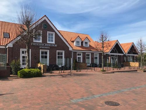 Friesischer Hof, Ferienwohnungen mit Indoor Spielplatz, kostenfreien Parkplatz und W-Lan
