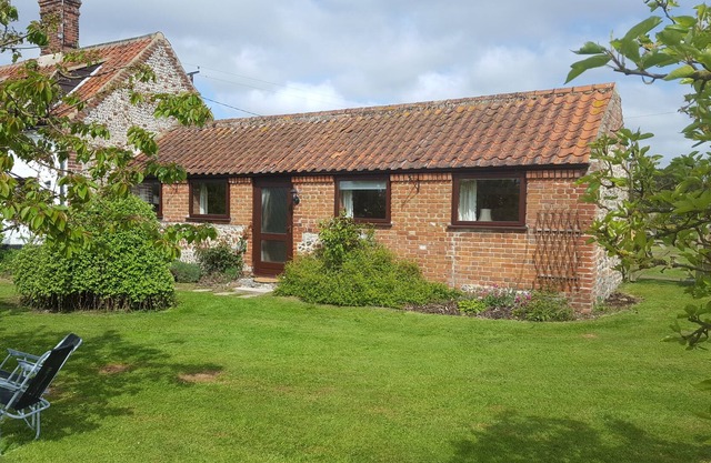 Garden Cottage est une grange aménagée dans un charmant jardin orienté sud
