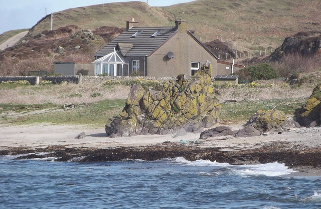 A detached cottage with views across to Gigha and the Paps of Jura.