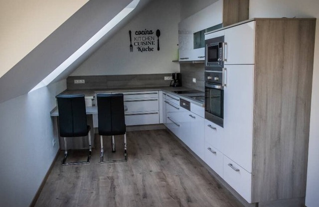 Appartement mansardé confortable avec espace sauna