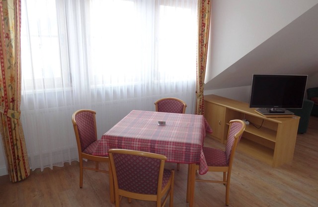 Appartement de vacances confortable donnant sur la pelouse pour bronzer vers Main