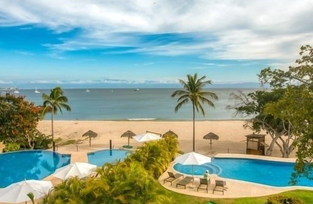 Condo 5 étoiles face à la plage - Membre Premier / Superbe cuisinier / gouvernante / voiturette de golf