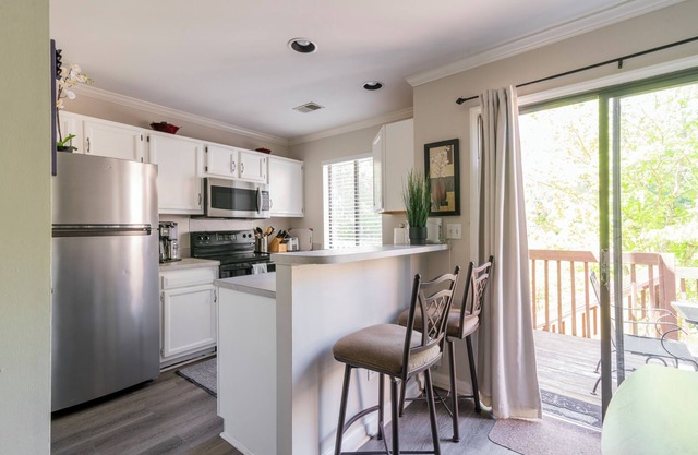 Magnifique maison de ville 2bd 1. 5ba sur terrain de golf. 2 lits Queen et un canapé-lit.