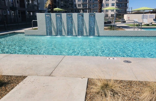 Gorgeous apartment with private bed and bath- heated pool and gym
