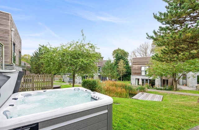 Superbe maison connue sous le nom de Sky Deck en raison de son design innovant avec une grande terrasse sur le toit allo