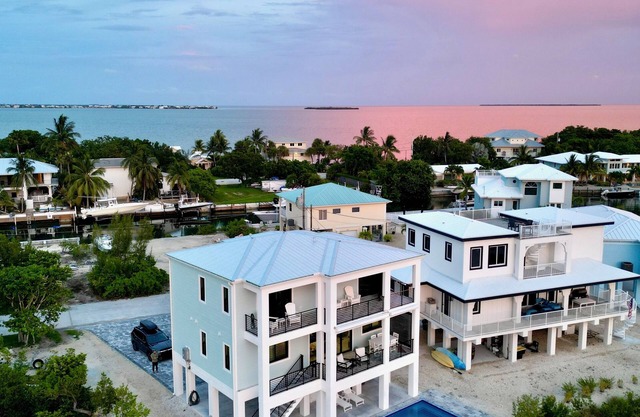 Gorgeous new build on Cudjoe Marina Basin with 140 ft boat dock and private pool