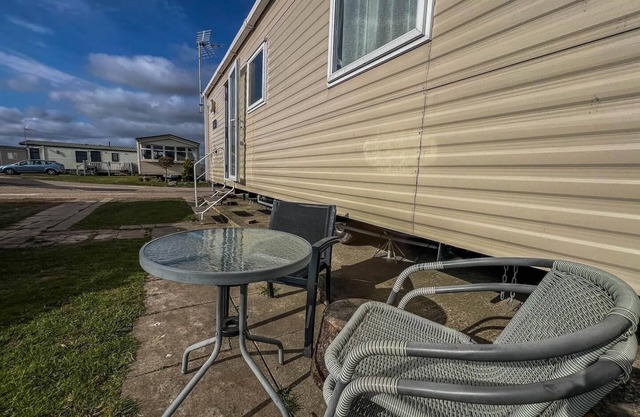Great caravan with modern furnishings at Dovercourt Holiday Park ref 44007D