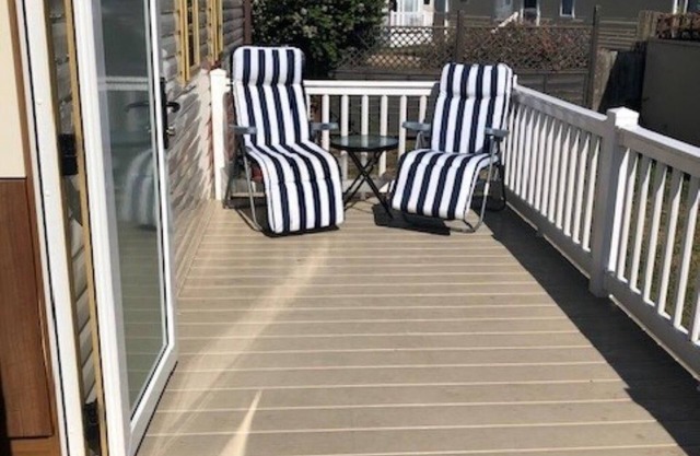 Great caravan with decking and Wi-Fi at Dovercourt Holiday Park ref 44002F
