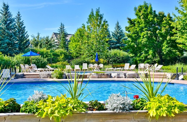 Ground floor condo, fireplace, private washer/dryer, and seasonal pool