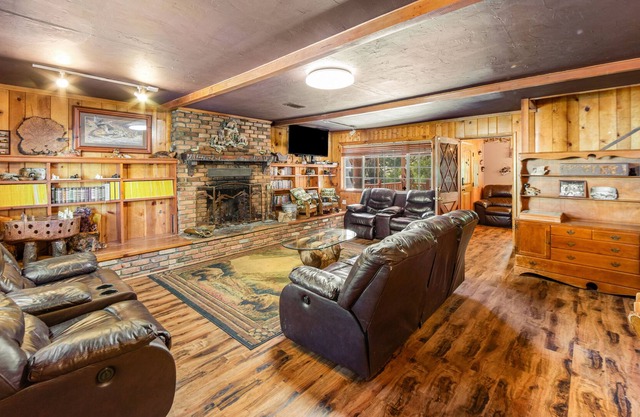 Group getaway with bar & game room, fireplaces, deck, and grill - dog-friendly