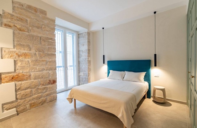 GuestHost - Bright Apartment Trani