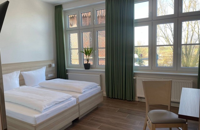 Guesthouse Besandung - Apartment 302 - Lokschuppen Pasewalk- Guesthouses with double room, single room and kitchen