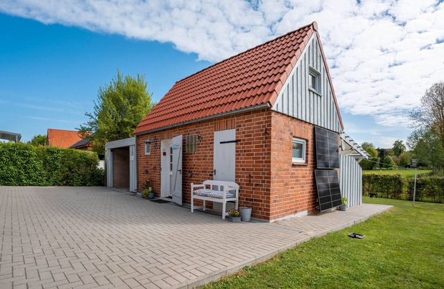 Maison d'hôtes "Bezauberndes Lütt Hus" avec terrasse privée, jardin partagé et Wi-Fi