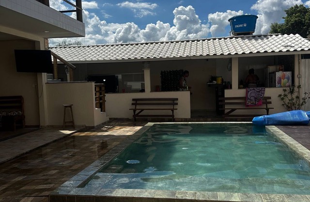 House for relaxation with games area and barbecue