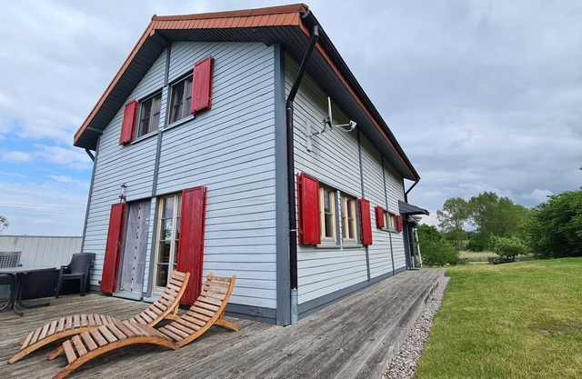 H12 Holz-Ferienhaus Haffblick Russow près de Ostseebad Rerik - Cottage en bois de 4 pièces avec cheminée (100 m²;