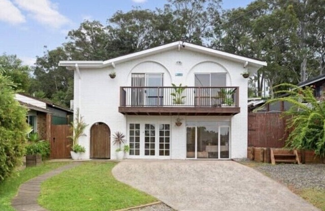 Spacious and stylish home with huge landscaped backyard