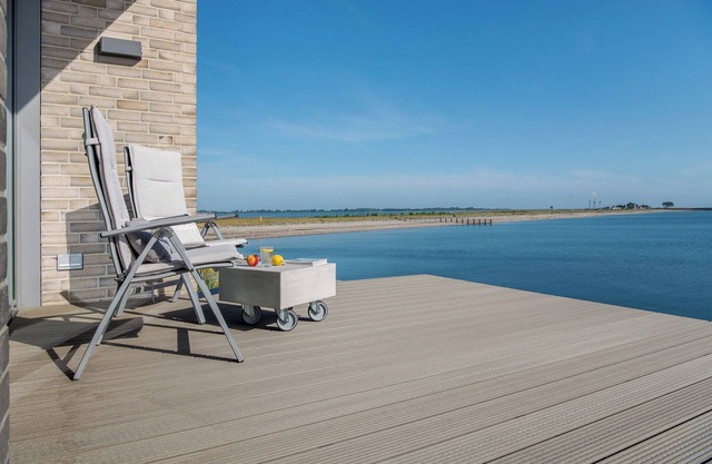 Heimathafen2 - Vue sur la mer Baltique, 1ère rangée, sauna, foyer au gaz, 2 terrasses, directement sur la plage