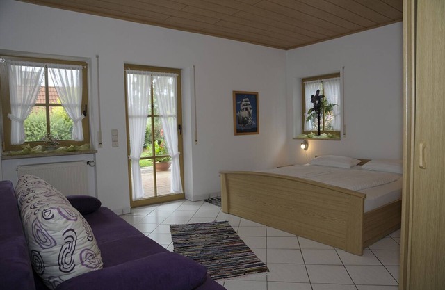 Appartement lumineux avec jardin idéal pour les familles et les propriétaires de chiens