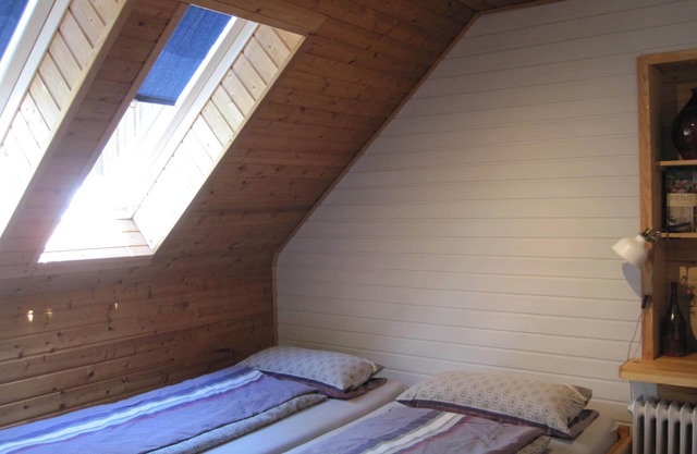 Appartement lumineux à l'étage avec un coin salon confortable