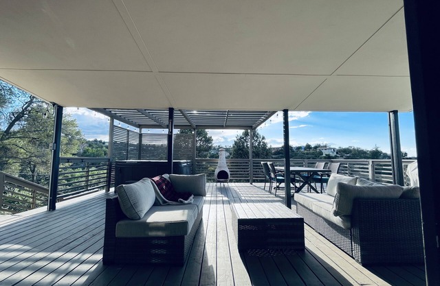 Hillside home in town with jacuzzi and views!