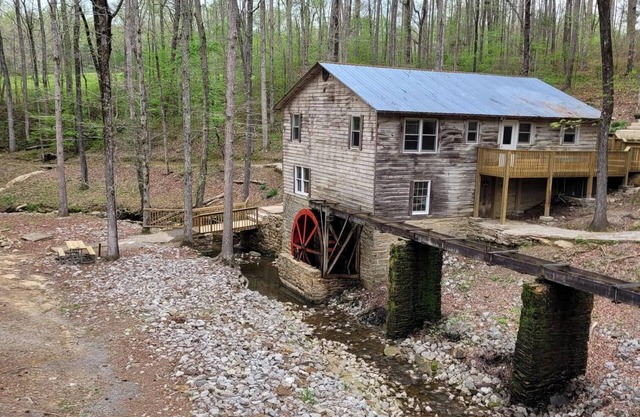 Historic Cabin in a natural setting with waterfalls and covered bridge